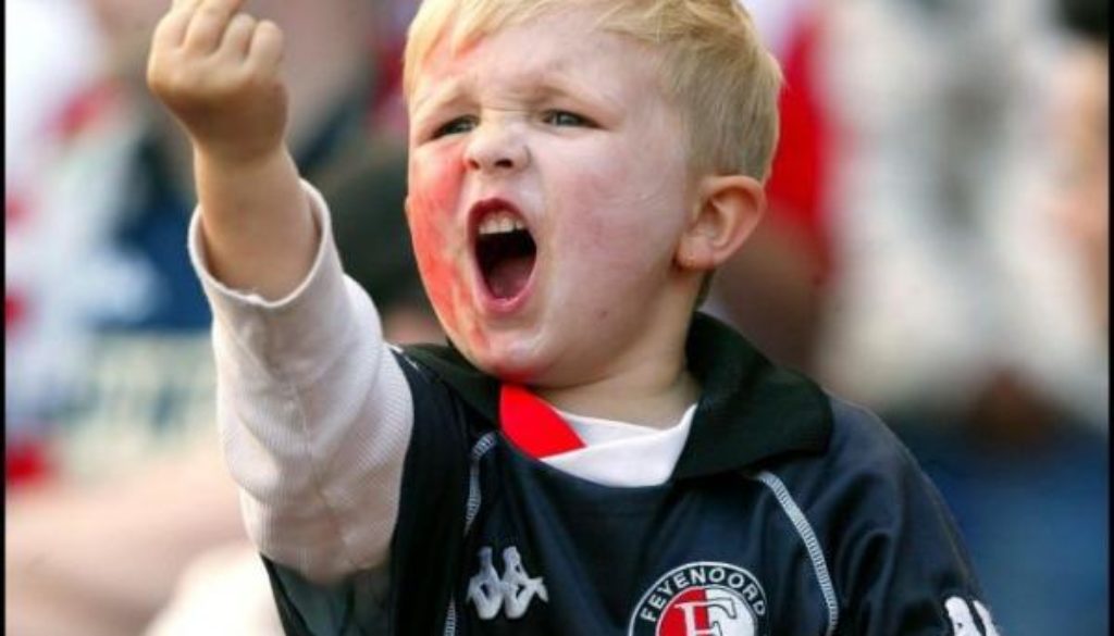 Brat kid giving the middle finger